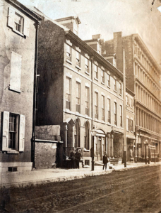 An 1859 photograph showing row homes on Chestnut Street near Fifth.