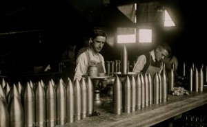 Men manufacturing ammunition for small arms and artillery.