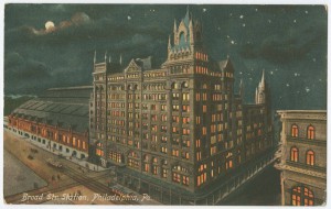 A color engraving of Broad Street station at night, showing the headhouse and 