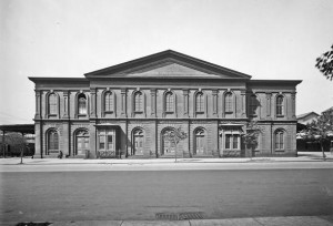 A black and white photograph of a Pennsylvania Railroad freight depot