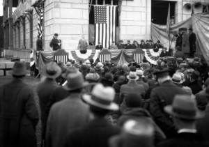 photo of a crowd gathered for the laying of the cornerstone of the school district's administration building