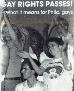 A black and white image showing people cheering and looking to the left of the viewer. The image was part of a newspaper story, and there is text over the image that reads 