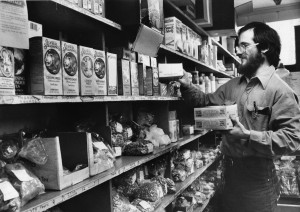 A manager stocks the shelves at Weaver's Way Co-op