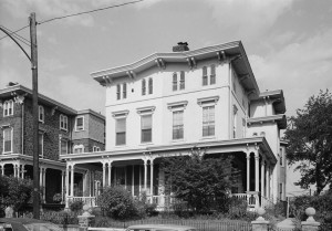 A black and white photo of an Italianate twin mansion built as part of Woodland Terrace, West Philadelphia.