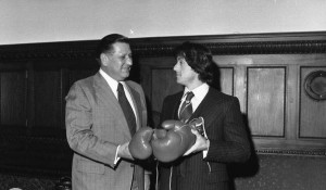 A black and white photo of Mayor Frank Rizzo and Sylvester Stallone holding boxing gloves