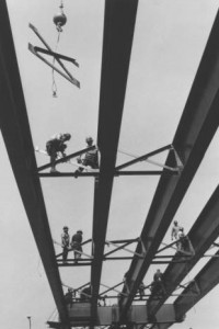 Steel workers constructing steel girters for the Betsy Ross Bridge.