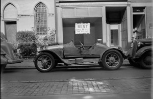 A "Jalopy," or an old car in poor condition on Pine Street in the late 1930s.