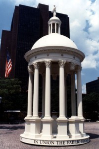 The edifice, patterned after a neoclassical temple, was thirty-six feet high and supported by thirteen columns, one for each of the new states. It symbolized the Federalist ideal of an elevated center raised by and over the people.