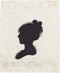 A hollow-cut profile silhouette created using a Physiognotrace, or device that drew an outline of a figure or object. The outline was then cut out and had details added with black ink (with a black piece of paper showing through the cutout for shadow-like contrast).