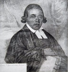 Black and gray portrait, seated with bible, half length.