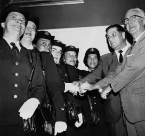 Police Commissioner Frank L. Rizzo and Mayor James H.J. Tate promoting several female police officers.