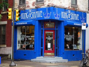 color photo of King of Shave barber shop at Pine and 12th Streets, Philadelphia. June 2016.