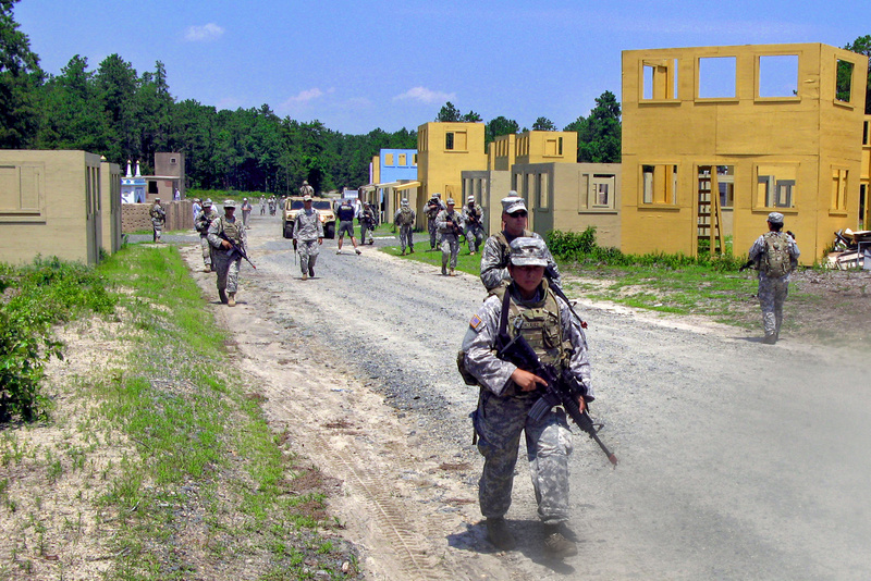 color photo of troops during training at Joint Base McGuire-Dix-Lakehurst, N.J., before deploying to Afghanistan in 2011.