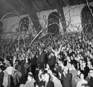 Villanova basketball fans throwing streamers onto the court during a basketball game