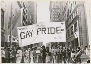 Gay pride parade with banner reading Phila. Gay Pride Day '72
