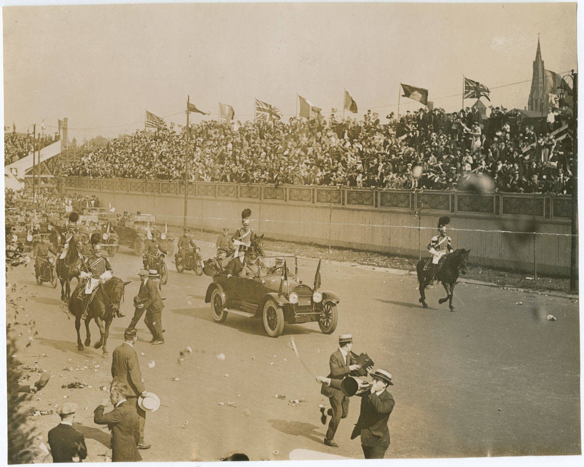 Black and white photograph of the First Troop Philadelphia City Cavalry escorting General John Pershing during a parade in 1919.