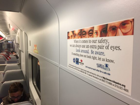 In the years after the 9/11 terror attacks, the public was again urged to play a role in the public defense. Especially in mass transit, signs such as this one on a PATCO commuter train reminded passengers to be vigilant. (Photograph by Donald D. Groff for The Encyclopedia of Greater Philadelphia)