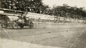 A Car Races Past the Crowd at the 1910 Fairmount Park Races.