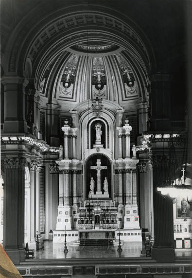 A black and white photograph of the alter at the Church of the Gesu
