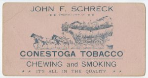 an advertisement for Conestoga tobacco showing a horse-drawn covered wagon laden with tobacco