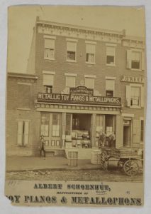 A photograph of the Albert Schoenhut Toys storefront. 