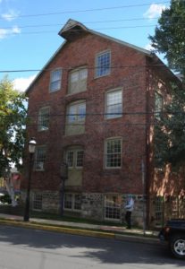 Photograph of brick building formerly used b Doylestown Agricultural Works