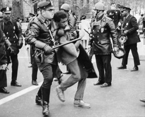 Photograph of Black Power demonstrator being arrested at rally