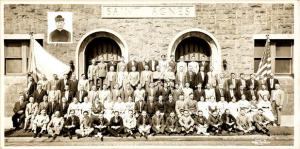 This undated black and white photograph shows a group of people outside Saint Agnes Saint John Nepomucene Roman Catholic Church in Philadelphia.