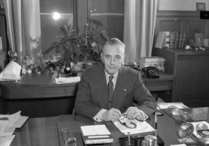 Photograph of Richardson Dilworth sitting at his desk