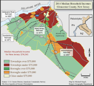 a map depicting Gloucester county's municipalities. Different colors are used to indicate the average household income in each municipality. Railway lines and the dates of their construction are also marked.