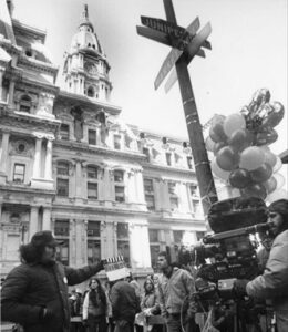 the film's crew in-action in front of City Hall