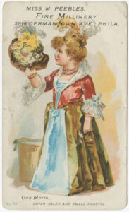 a color advertisement for Miss. M Peebles, fine millinery. The illustration shows a young girl in a floor length gown with a feathered comb in her hair. She holds an ornate feathered hat in one hand. Below her text reads: "Our motto: Quick sales and small profits."