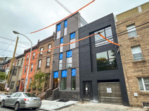 picture of newly built rowhomes from street level
