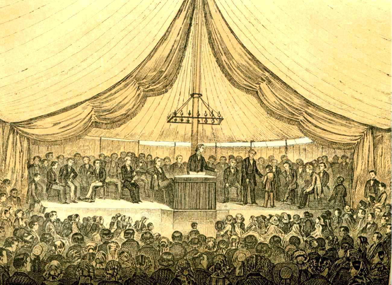 An illustration depicting the inside of a large tent. A stage stands in the center with a preacher standing behind a podium. A crowd of people is gathered around the staging listening to the speaker.